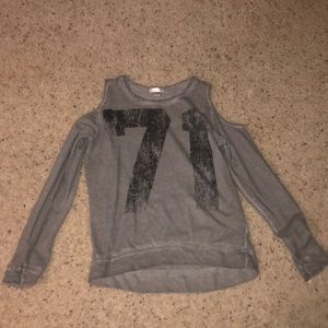 A off the shoulder top with 71 on it